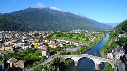 Adda river and city of Morbegno in Valtellina. Aerial view photo