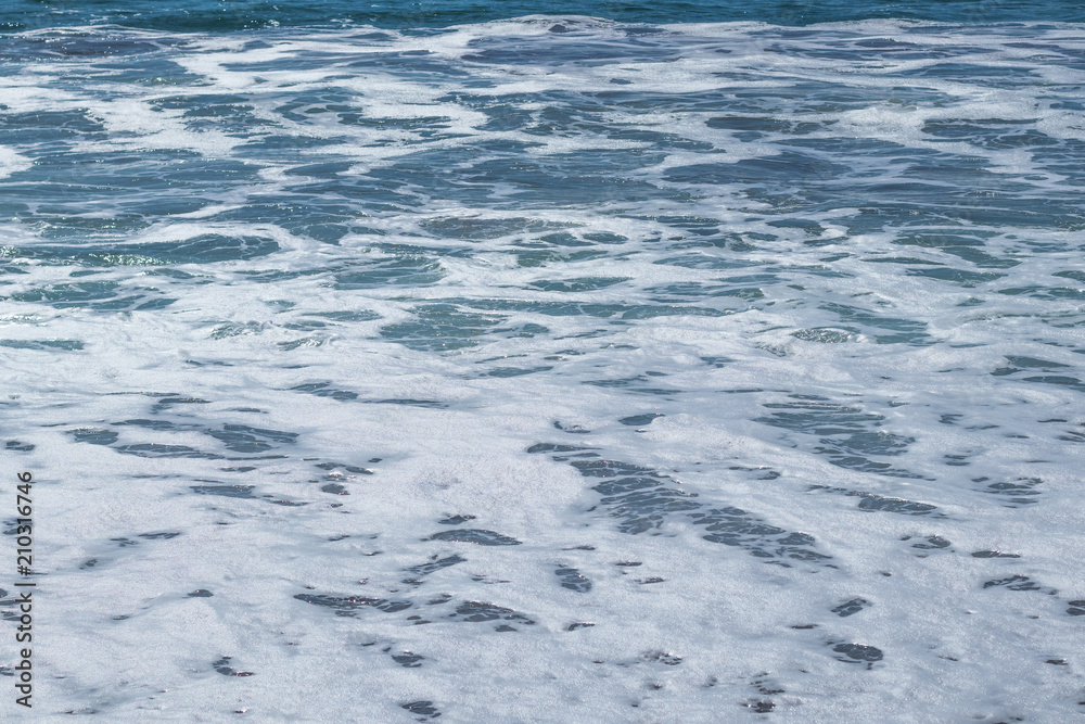 Abstract background of bubbly boiling sea waves in a storm Abstract background of bubbly boiling sea waves in a storm