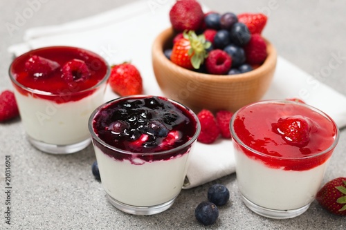 Three glass cups of simple fruit parfait