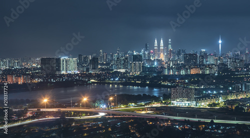 Panorama .view in the middle of Kuala Lumpur cityscape skyline .Night scene , Malaysia .