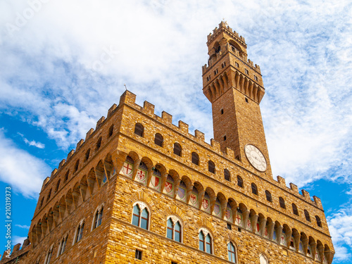 Bottom view of Pallazo Vecchio, Old Palace - Town Hall, with high bell tower, Piazza della Signoria, Florence, Tuscany, Italy. photo