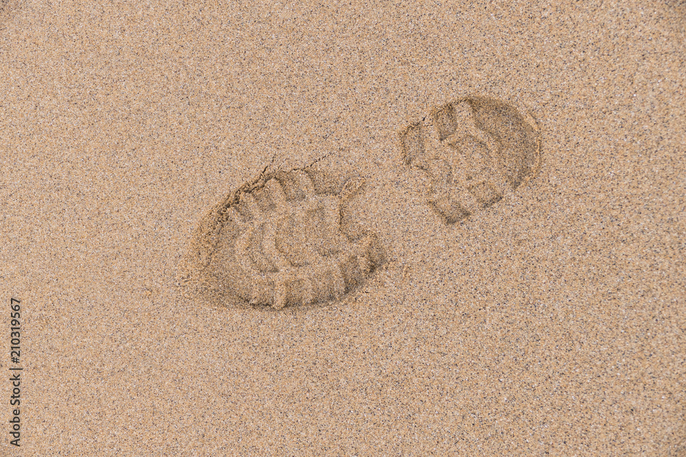 Empreintes de pas sur le sable