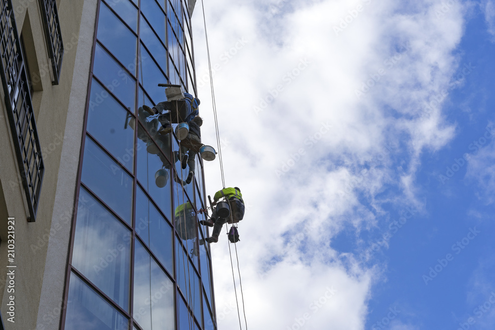 Wash Windows in high-rise buildings offices, glass cleaning service Wash Windows in high-rise buildings offices, glass cleaning service