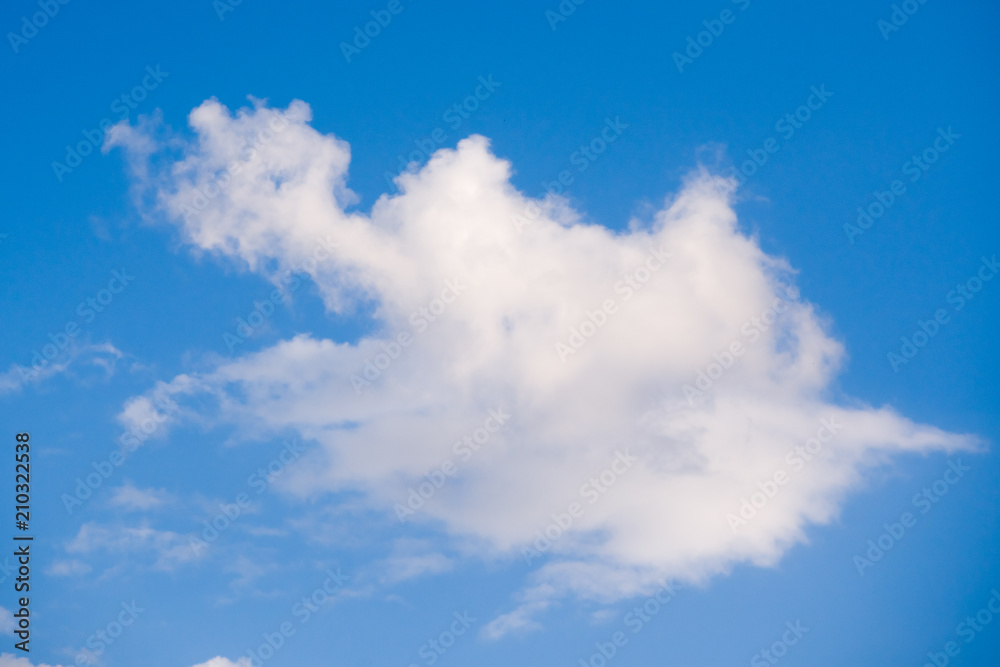 Cloud against blue sky