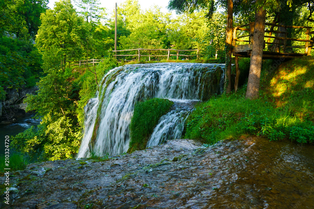 Waterfall at Rastoke in Croatia in a sunny summer evening