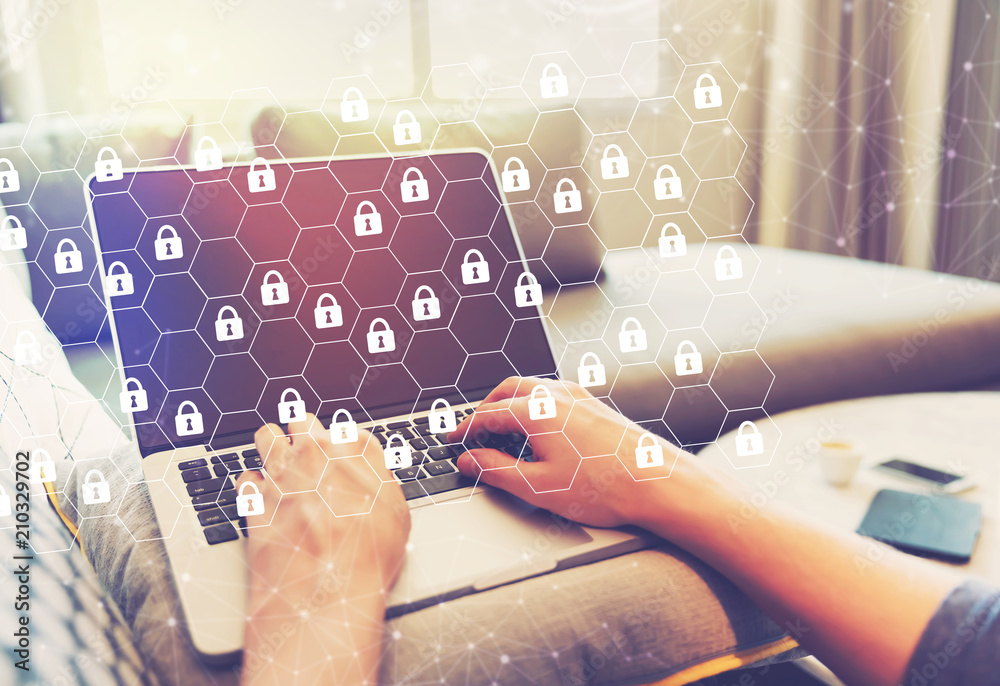 Fototapeta premium Cyber Security concept with person using a laptop computer