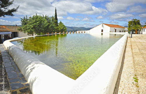 La Laguna, gran alberca de Cañaveral de León, pueblo del Parque Natural Sierra de Aracena en la provincia de Huelva, España photo
