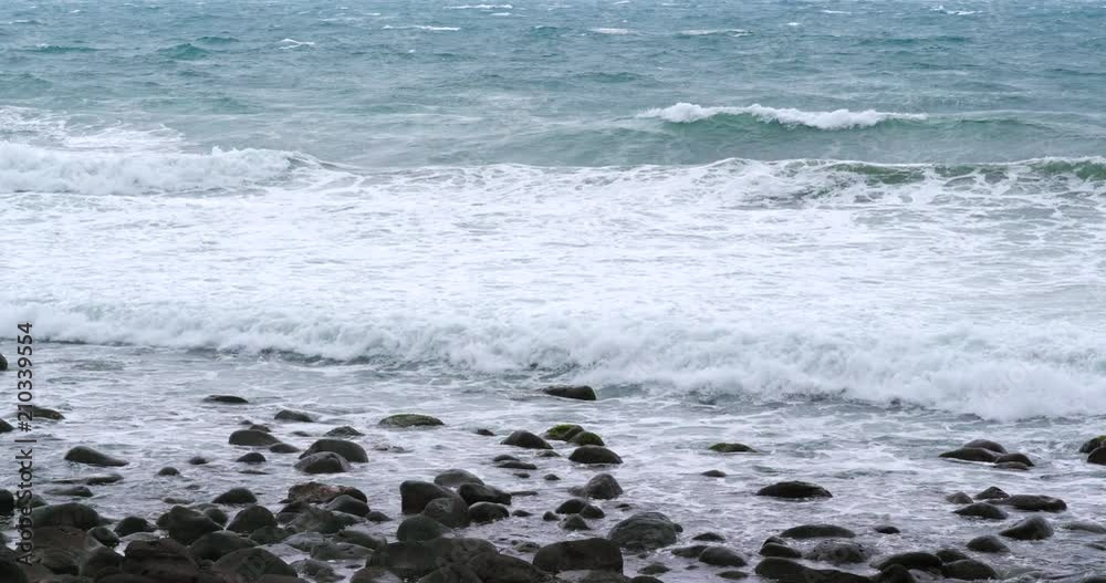 Beautiful sea waves with stone and rock Beautiful sea waves with stone and rock
