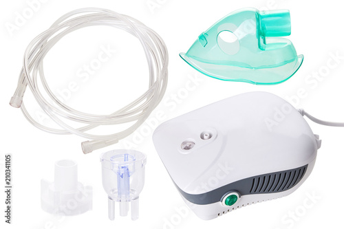Medical equipment for inhalation with respiratory mask,  nebulizer isolated on white background. Respiratory medicine. Asthma breathing treatment. Bronchitis, asthmatic health equipment photo
