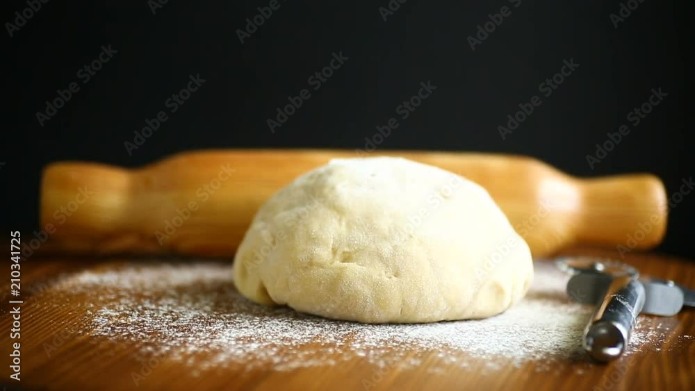 fresh dough with a rolling pin fresh dough with a rolling pin