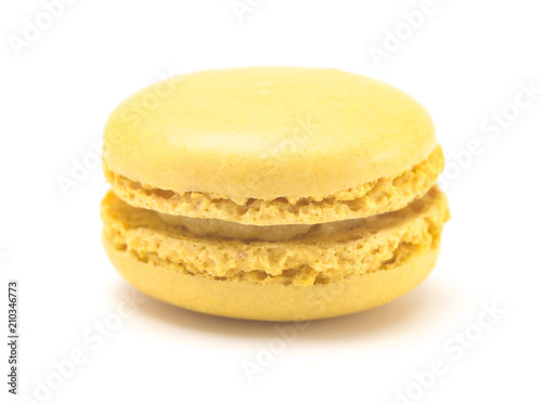 Single Yellow French Macarons on a White Background