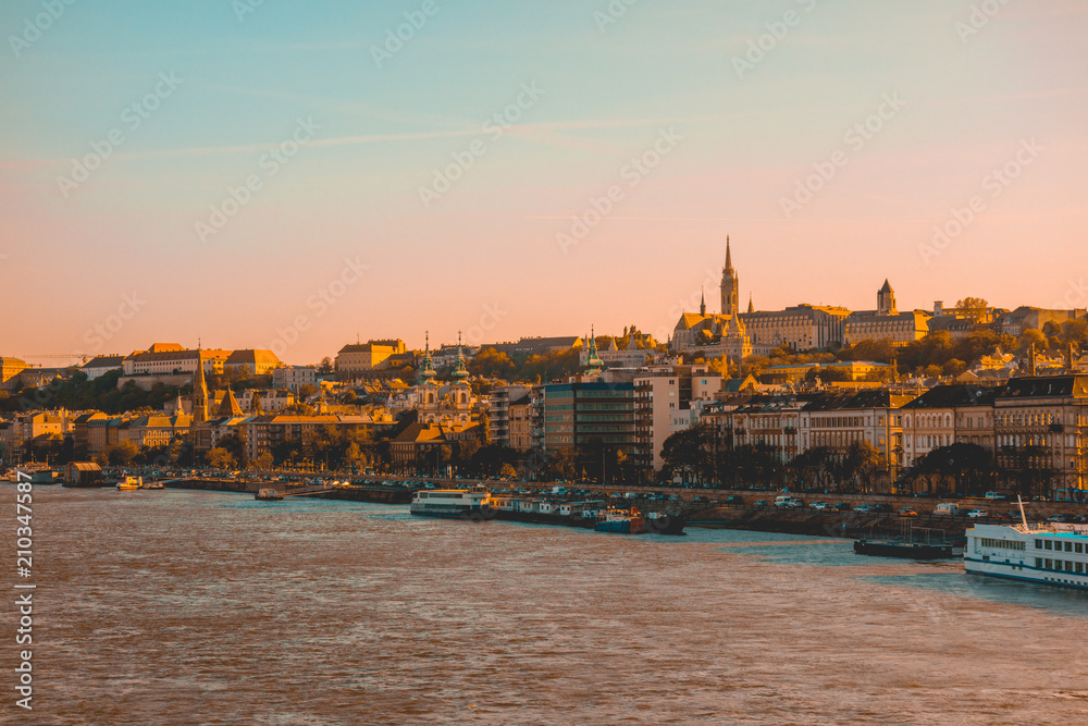 warm colored budapest from the danube river in the afternoon