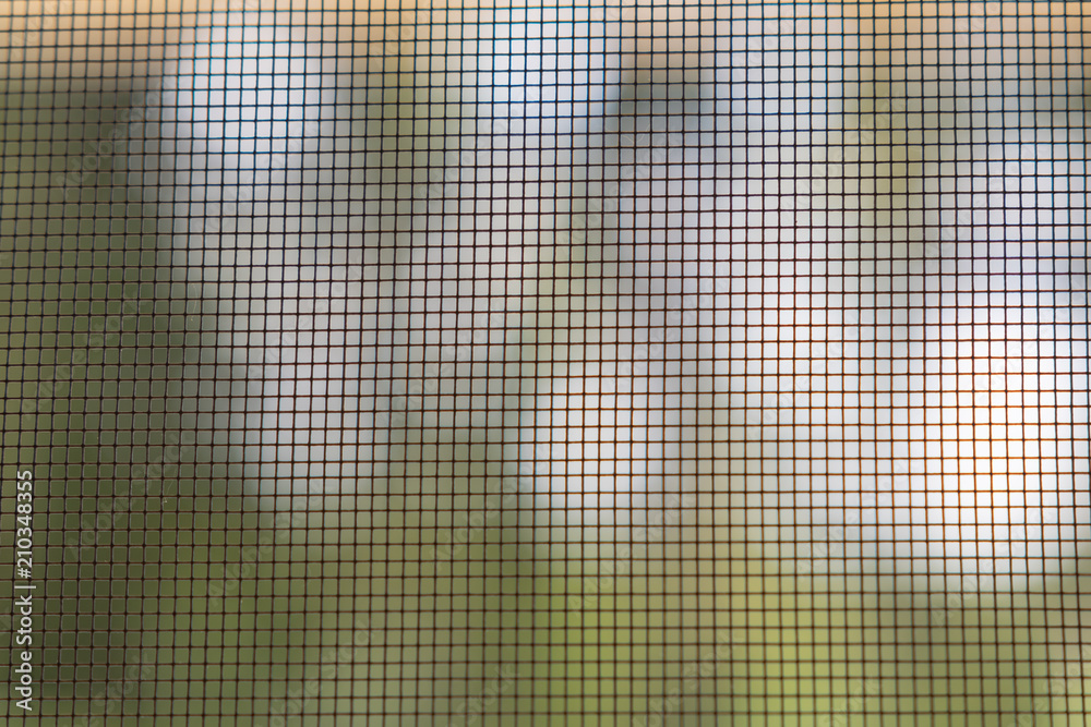 Insektenschutzgitter am Fenster gegen Mücken Insektenschutzgitter am Fenster gegen Mücken
