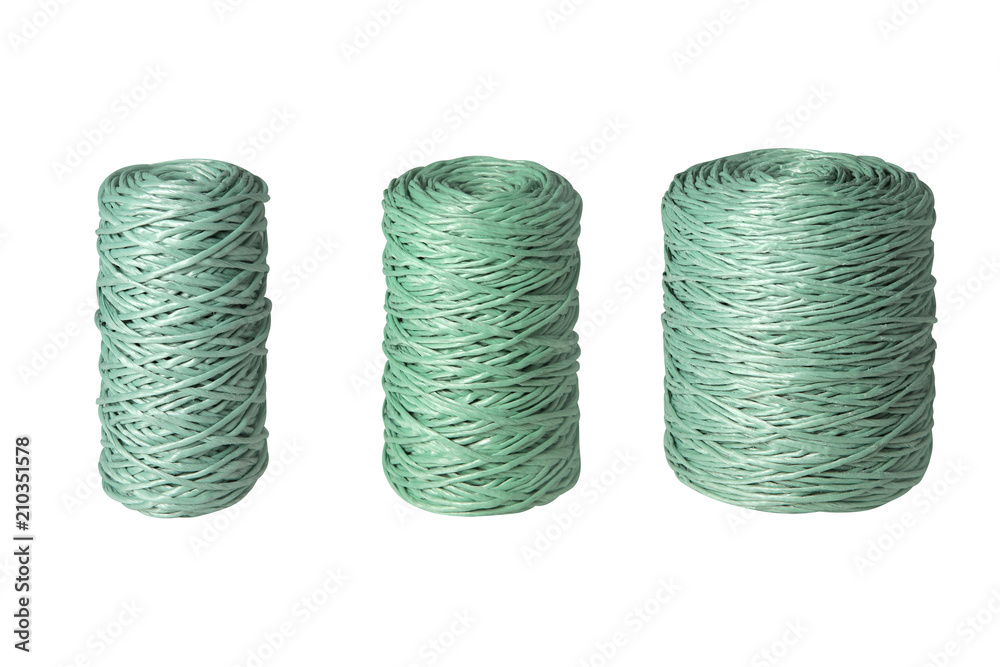 green clew of twine isolated on white background green clew of twine isolated on white background
