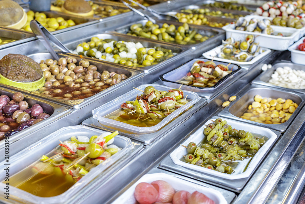 Various kinds of Olives at street Market in Spain.