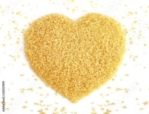 Heart-shaped of Sugar from sugar cane top view, Background granulated sugar yellow brown, Sucrose sugar, Red sugar