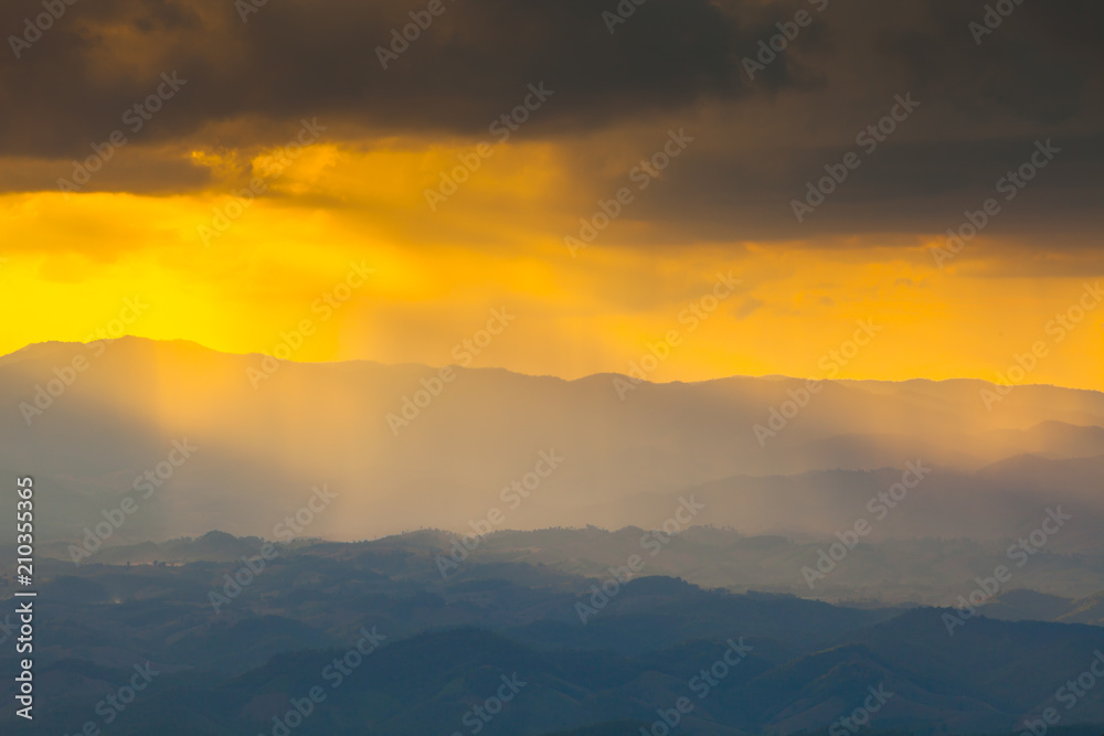 Colorful of sunset at mountain with cloudy on sky