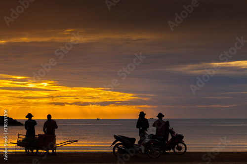 Colorful sky of sunrise on the beach located at hua-hin south of thailand
