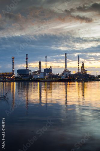 Oil refinery industry reflection on water © pattierstock