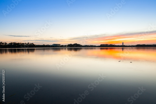 Sunset view of lake with colorful sky