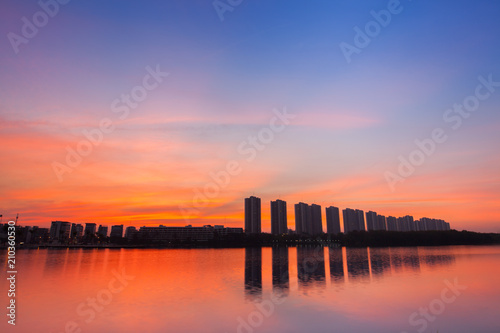 Reflection of condominium on water surface at sunset timing located at impact arina Bangkok Thailand 