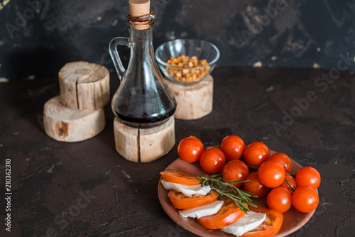 Mozzarella, cherry tomatoes and basil.Caprese salad photo