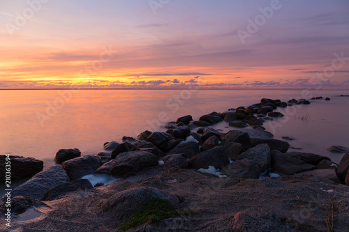 Rocky shore of the sea bay in the quiet evening © nuclear_xonix
