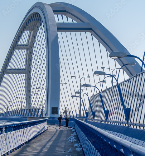 Jogging women on the bridge