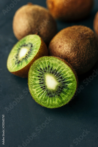 fresh kiwi fruit on black background