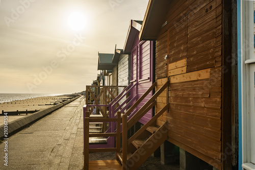 Seaside beach huts in winter sun