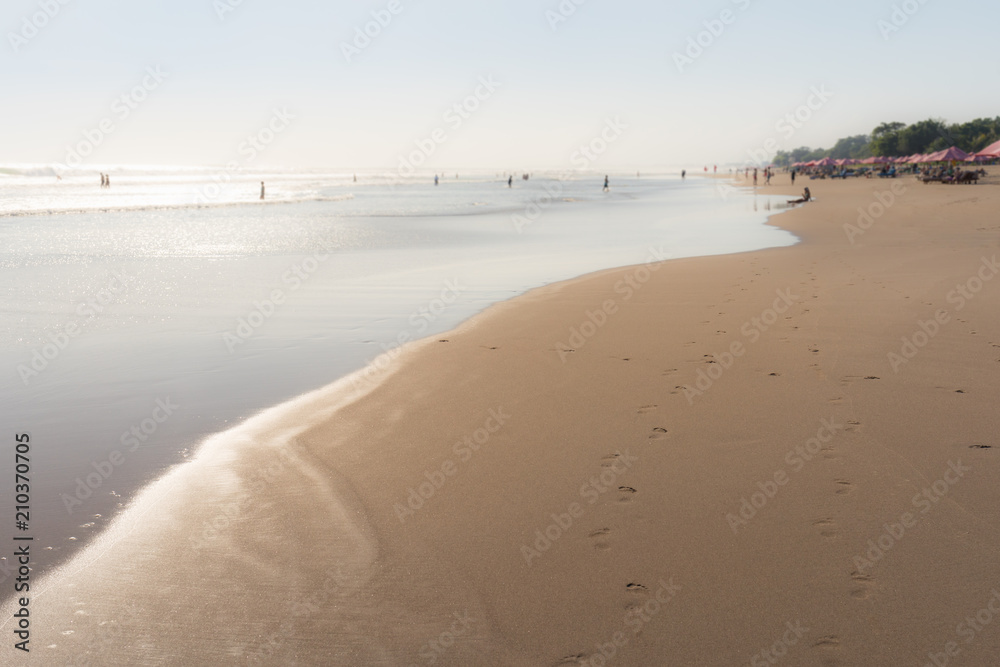 The purest sand of Kuta beach in the evening