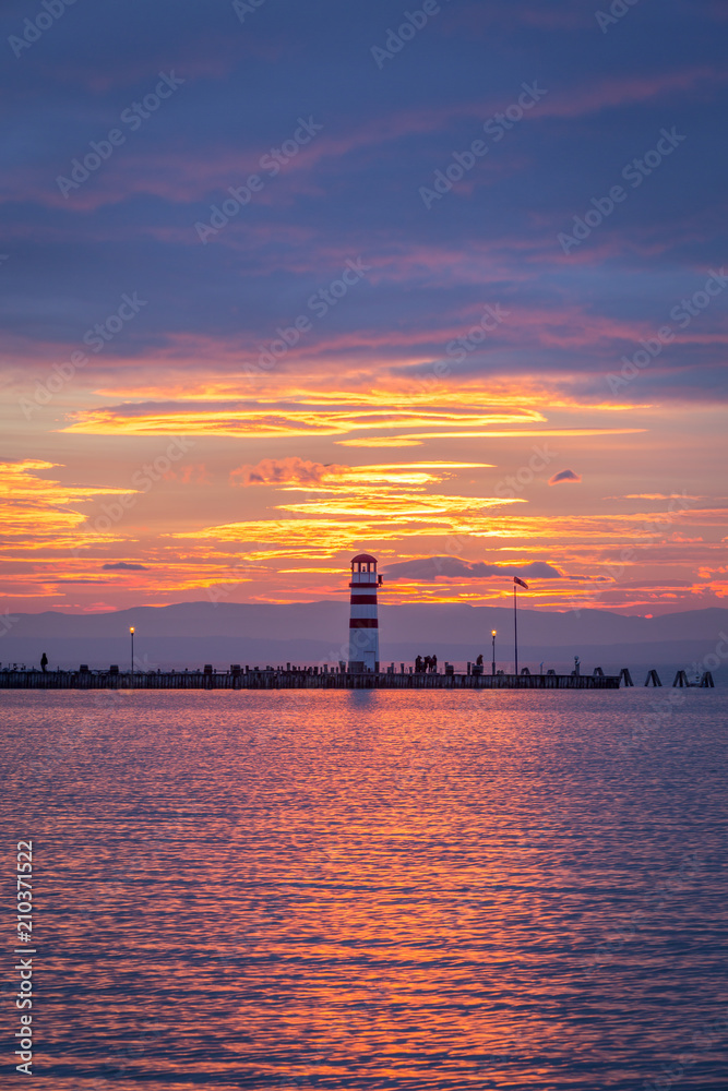 Lighthouse in Podersdorf am See at winter sunset, lake Neusiedler See, Burgenland, Austria Lighthouse in Podersdorf am See at winter sunset, lake Neusiedler See, Burgenland, Austria