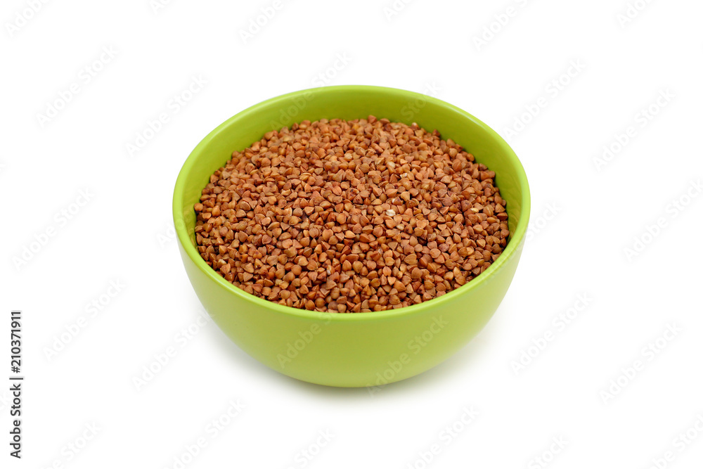 buckwheat in green plate on white background buckwheat in green plate on white background