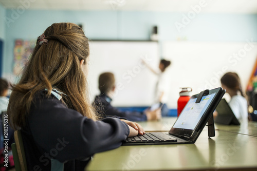 girl studies with her tablet