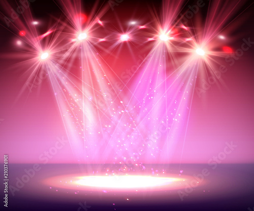 Spotlight on stage with smoke and light.