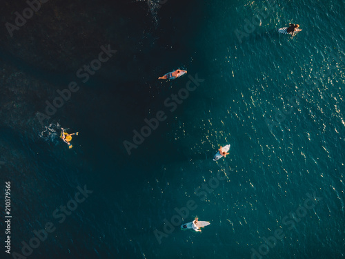 Aerial shooting surfing. Surfers in ocean