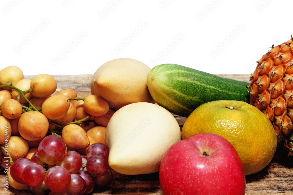 Fruit background,together,orange,apple,grape,mango,myanma grape,pine apple,cucumber,many fresh fruits mixed