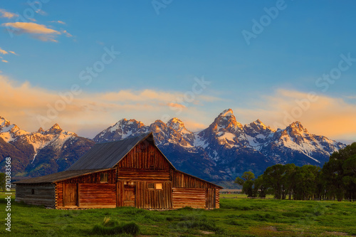This abandoned, vintage barn in Mormon Row has the Grand Tetons in the background. Located in Jackson Hole, Wyoming, it is listed on the National Register of Historic Places.