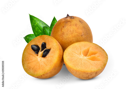 sapodilla fruit with green leaves isolated on the white background photo