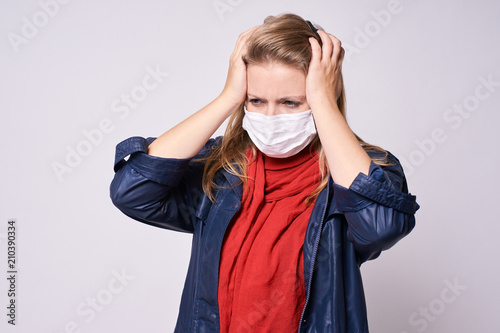 Headache. Young girl. White background