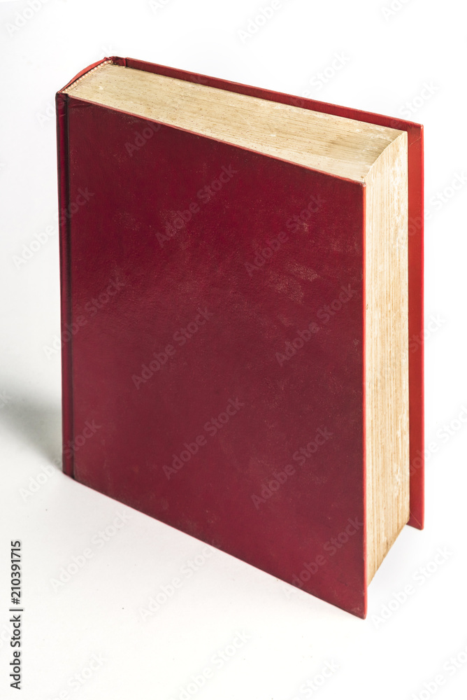 red hard cover book on white background red hard cover book on white background