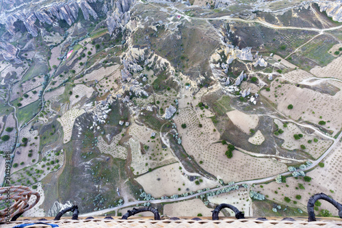 A canvas of a road that crosses the valley between the mountains, a view from a height. photo