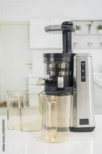 Electric juice extractor above the table