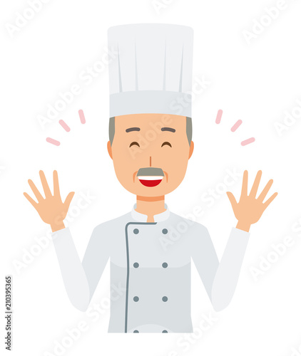 An elderly male chef wearing a cook coat is spreading his hands