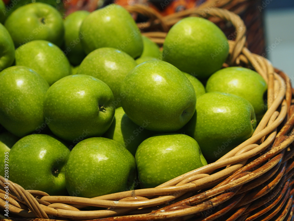 bulk fresh green apple fruits in basket for sale in supermarket bulk fresh green apple fruits in basket for sale in supermarket