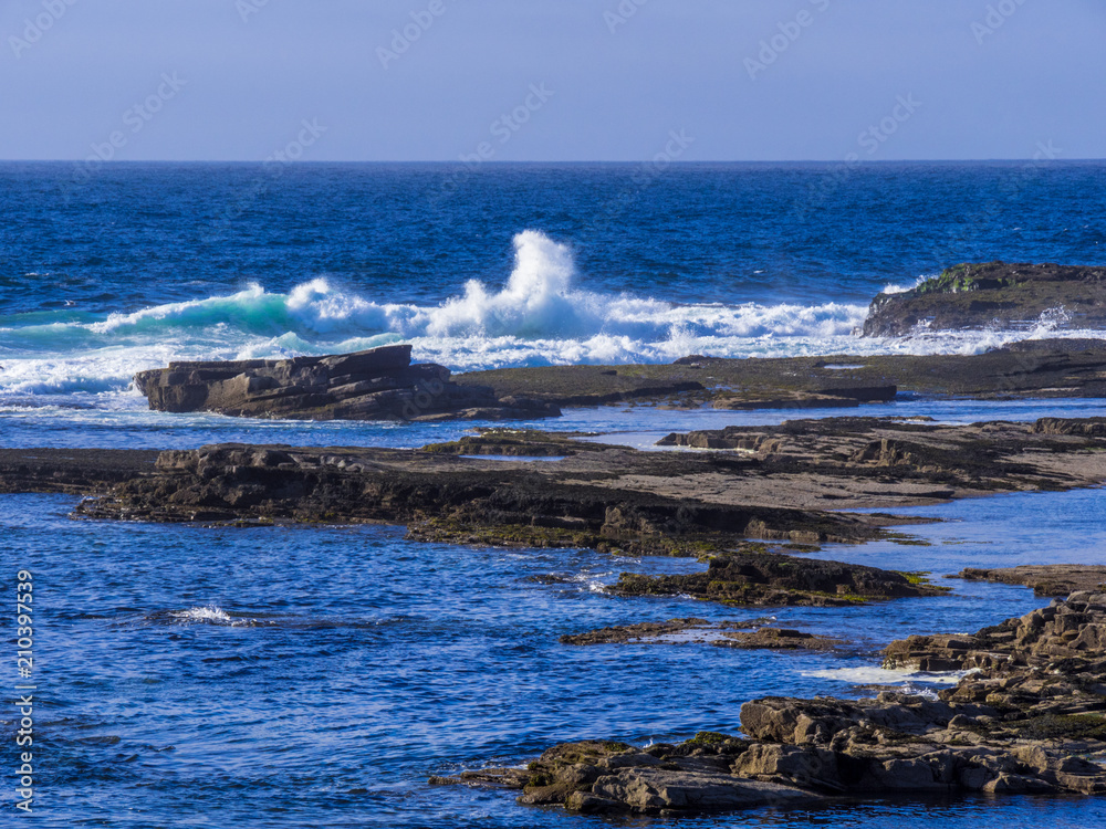 Wild Atlantic ocean water at a rocky coast Wild Atlantic ocean water at a rocky coast