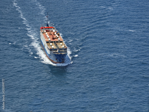 Cargo ship going on route