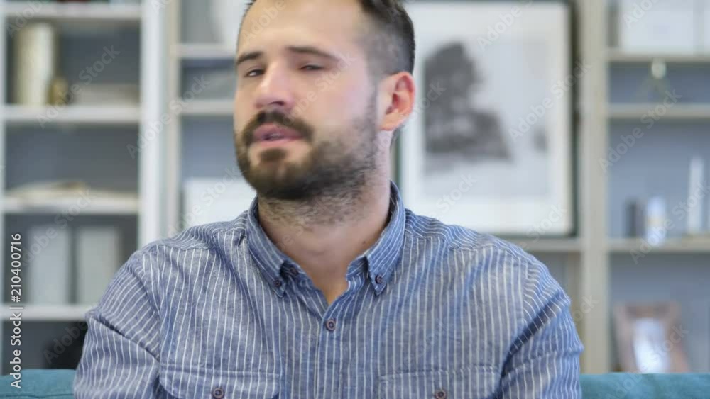 Adult Man Upset by Loss while Working in Office Adult Man Upset by Loss while Working in Office