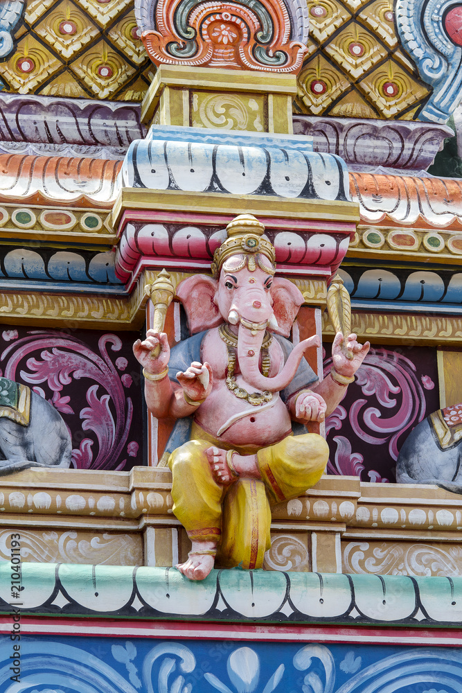 Hindu God Ganesha statue in temple, island Mauritius, close up
