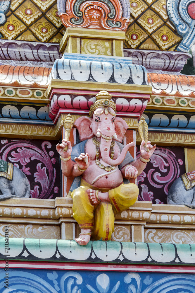 Hindu God Ganesha statue in temple, island Mauritius, close up Hindu God Ganesha statue in temple, island Mauritius, close up
